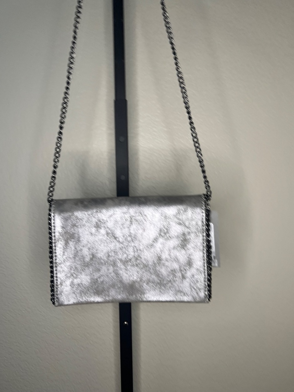 Chelsea 28 metallic silver convertible crossbody/clutch
